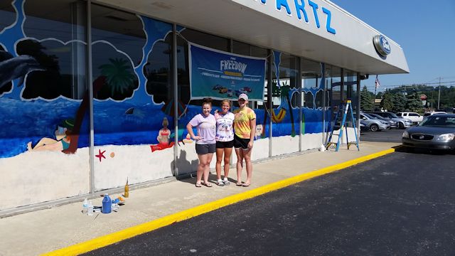 Students in School Activites (Athletics, Classrooms, Plays, Band, Art Projects) (Art Sudents Posing beside their Mural.jpg)